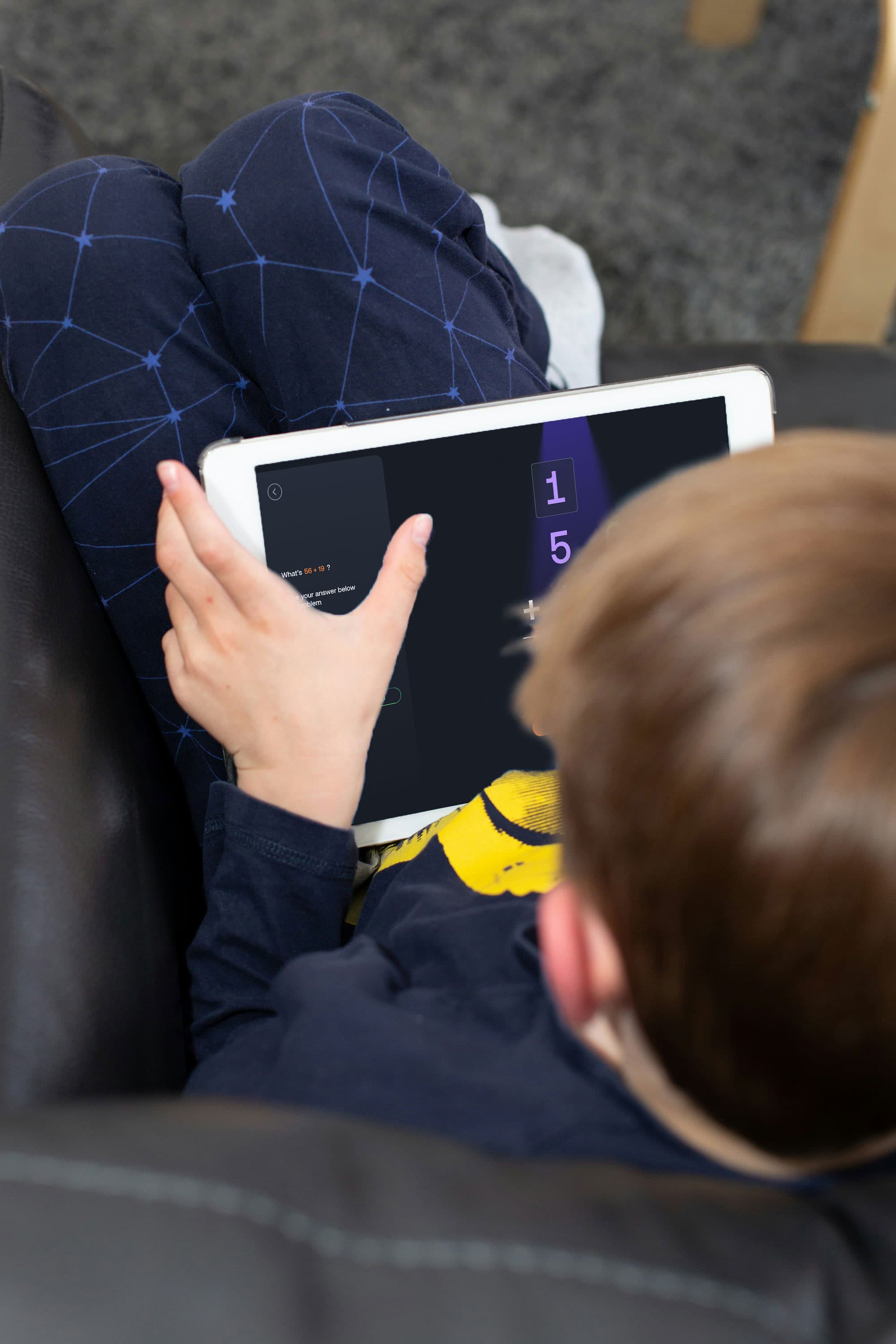 Students learning together with tablets in a classroom